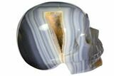 Polished Banded Agate Skull with Quartz Crystal Pocket #148116-1